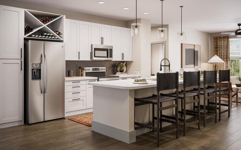 a kitchen with white cabinets